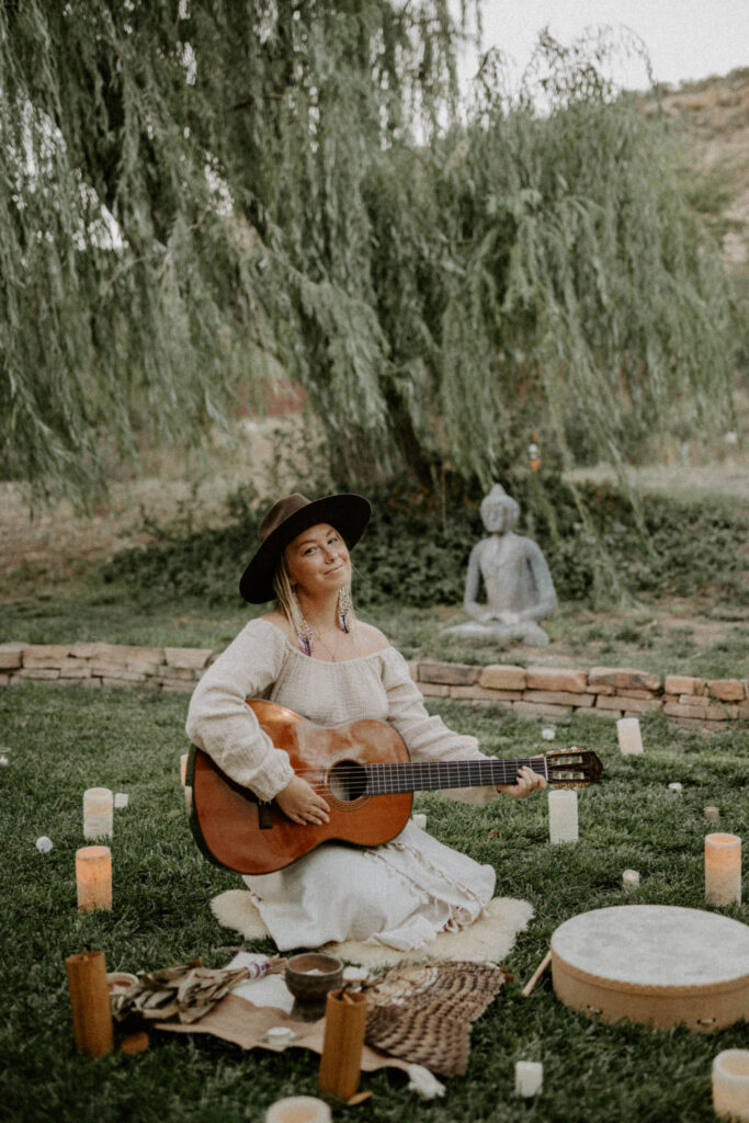 woman playing guitar in sedona